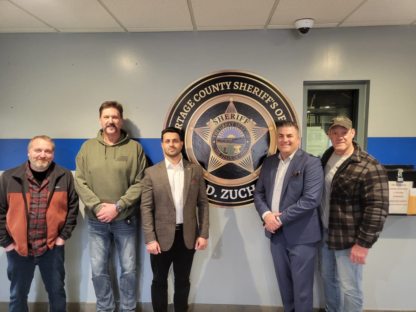 Vik Sandhu with elected officials at an event